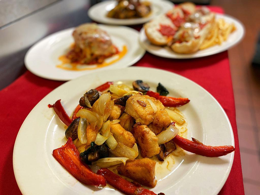 Chicken Arrabbiata · Sauteed chicken breast with onions, mushrooms and hot and sweet peppers. Gluten free.