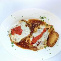 Chicken Milano Dinner · Breast of chicken with eggplant, ham, roasted red peppers and mozzarella, in a sherry wine, ...