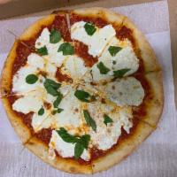 Traditional Margherita Pizza · Tomato sauce, fresh mozzarella