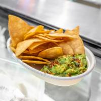 Guacamole and House-Made Tortilla Chips · Corn tortilla chips and fresh cucumber jalapeno guacamole.