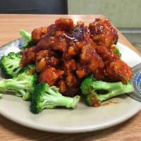 102. General Tso's Chicken · Chunks of marinated chicken deep fried crispy served in a chef's spicy sauce on a bed of fre...