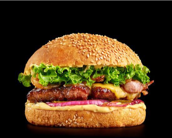 Angus Beef Burger · Juicy Angus beef stuffed in between a fresh baked bun.