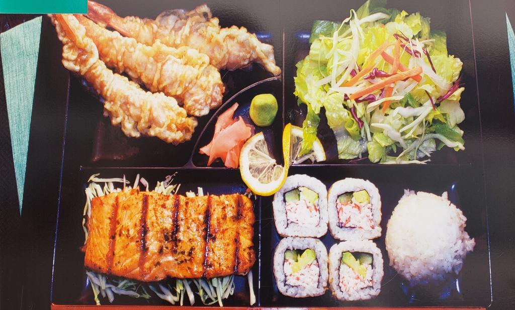 Salmon Bento Special · Salmon, shrimp tempura (3 pieces), california rolls (4 pieces), rice and salad.