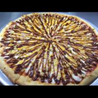 BBQ Chicken Lover Pizza · Chicken, onion, BBQ sauce, cheddar cheese, and Parmesan cheese.