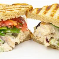 Walnut Cranberry Chicken Salad Sandwich · Served on 8 grain bread with leaf lettuce and tomato. Chopped chicken that has been tossed i...