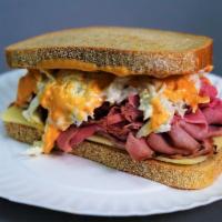 Corned Beef and Swiss Sloppy Joe · Lean Corned Beef and Swiss Cheese Dressed with Russian Dressing and Cole Slaw