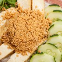 Vermicelli Salad with Tofu · Vegetarian. Rice vermicelli, lettuce, cucumber, mint, and scallion oil topped with crushed p...