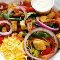 Build Your Own House Salad · Fresh mixed green medley, red onion, cherry tomatoes, croutons and shredded cheese. Add-ons ...