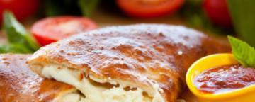 Cheese Calzone · Made with three cheese ricotta, Romano and mozzarella