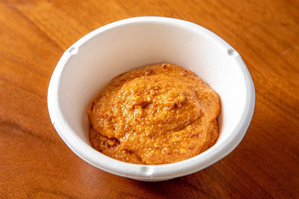 Red Coconut Chutney (Catering) · Classic chutney with coconut flakes, green chili and spices