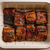 Tamarind Salmon · Norwegian salmon glazed with our sweet and sour tamarind sauce