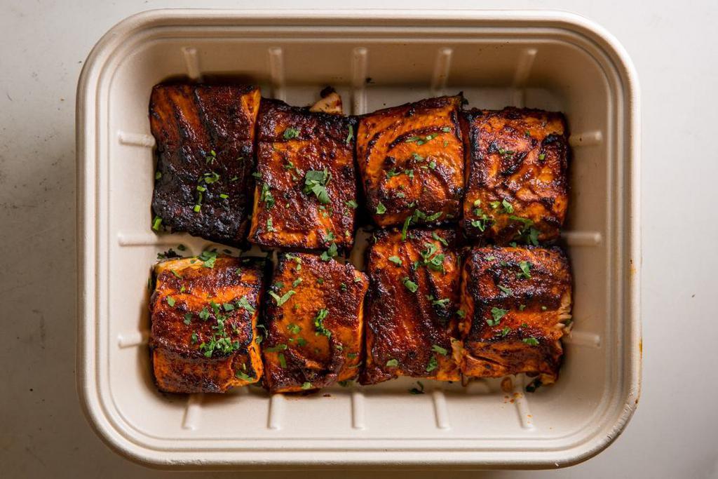 Tamarind Salmon · Norwegian salmon glazed with our sweet and sour tamarind sauce