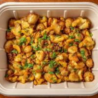 Gunpowder Potatoes (Catering) · Crispy new potatoes with gunpowder spice