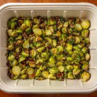 Roasted Brussels Sprouts (Catering) · Charred brussels sprouts tossed in our sweet and spicy sauce