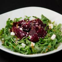 Beet Salad · Arugula, Roasted Beet, Goat cheese, Dijon Mustard Vinaigrette