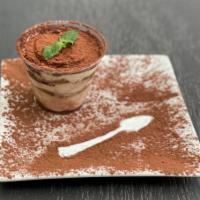 Tiramisú · Espresso soaked Pavesini cookies, surrounded by lightly sweetened mascarpone cream, covered ...
