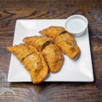 Empanadas  · Order of 2 empanadas served with our flavorful cilantro sauce. Chicken or beef and mozzarell...