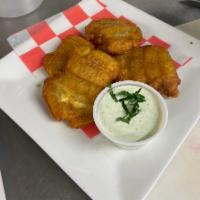 Fried Smashed Plantains  · Crispy golden plantains served with a side of our homemade garlic sauce. 