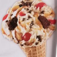 Cherry Vanilla Vacation Ice Cream · Vanilla ice cream, brownies, cherries and caramel.