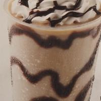 Coffee Ice Cream Milk Shake · Sweet cream ice cream, coffee mix, whipped cream and fudge.