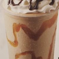 Snickers Ice Cream Milk Shake · Sweet cream ice cream, snickers, whipped cream and chocolate syrup
