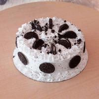 Cookies and Cream Ice Cream Cake · Chocolate cake bottom, sweet cream ice cream, Oreo cookies and vanilla whipped icing. SMALL ...