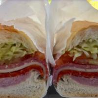Italian Combo No. 2 Sandwich · Ham, Salami, Pepperoni, Provolone Cheese, Lettuce, Tomatoes & Italian Dressing.