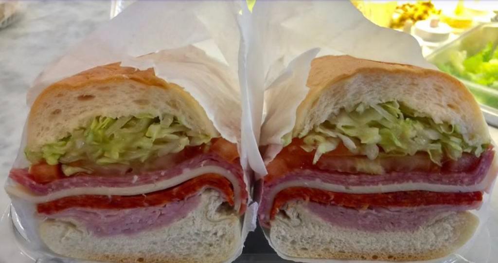 Italian Combo No. 2 Sandwich · Ham, Salami, Pepperoni, Provolone Cheese, Lettuce, Tomatoes & Italian Dressing.