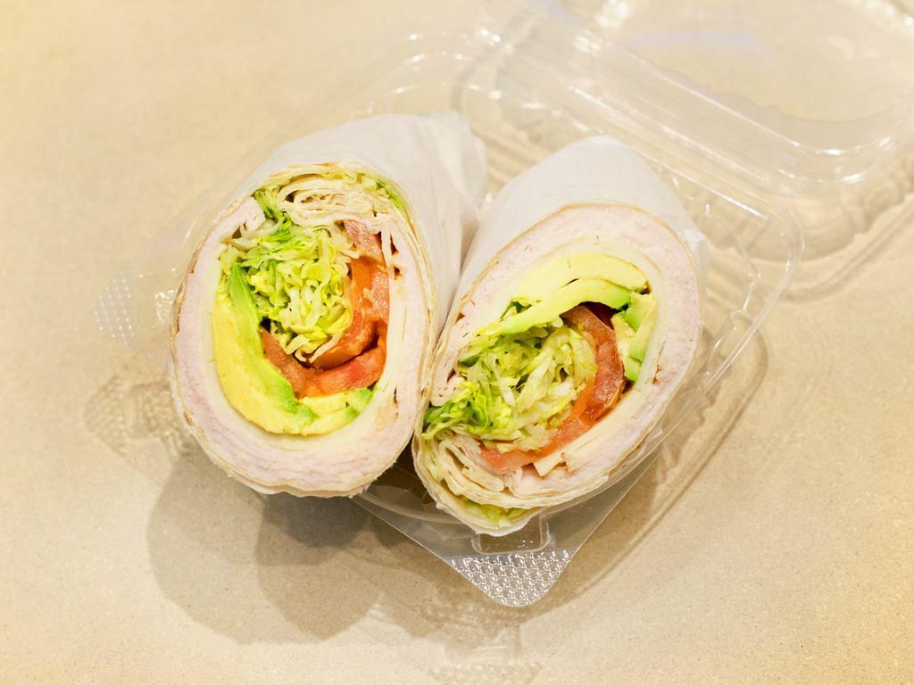 Simply’s Wrap · Oven Gold Turkey, Swiss Cheese, Avocado, Lettuce, Tomatoes & Ranch Dressing.