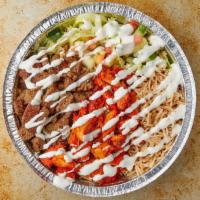Chicken Over Rice with Salad · Marinated Boneless Chicken Served with Rice, lettuce, tomatoes, onion and white sauce