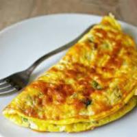 Greek Omelette · Greek omelet with fresh spinach, tomatoes, and perfectly cut feta cheese. Served with potato...