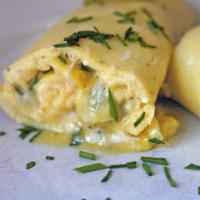 French Omelette · Thinly cut bacon, brie, fresh herbs, and scallions are served in this tasteful omelet. Serve...