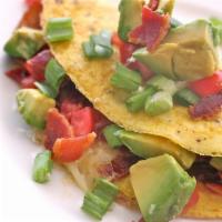 California Omelette · Sauteed mushrooms, avocado, pepper Jack cheese, and tomatoes folded into this delectable ome...