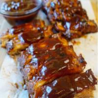Baby Back Ribs · Served with pita bread.