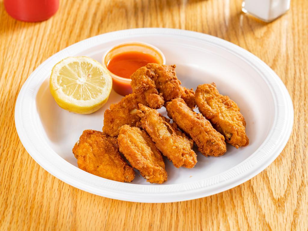 7 Piece Buffalo Wings · Served with a choice of a sauce. Mild spicy, breaded and deep fried.