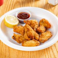 7 Piece Plain Wings · Served with a choice of a sauce. Breaded and deep fried.