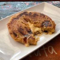 Plantain Arepa · A fullmoon patty dough made from ripe plantains and stuffed with cheese, jalapeño and chipot...