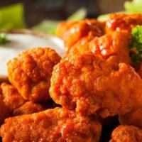 Boneless Wings · Mild, medium, hot, BBQ, hot BBQ, or spicy garlic. Add celery and blue cheese or ranch for an...