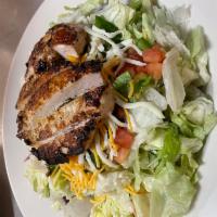 Grilled Chicken Salad · Grilled chicken breast over mixed greens with provolone and cheddar cheese, onion, green pep...