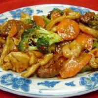 S1. Triple Delight · Shrimp, chicken and beef sauteed with Chinese vegetables, broccoli, snow peas and mushroom. ...