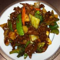 Hunan Beef · With white rice. Hot and spicy. 
