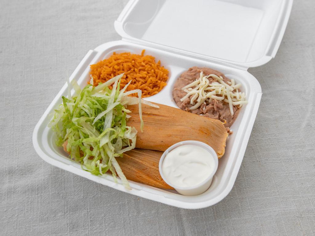 2 Tamales Combo · 2 chicken tamales, rice, beans, lettuce and sour cream.