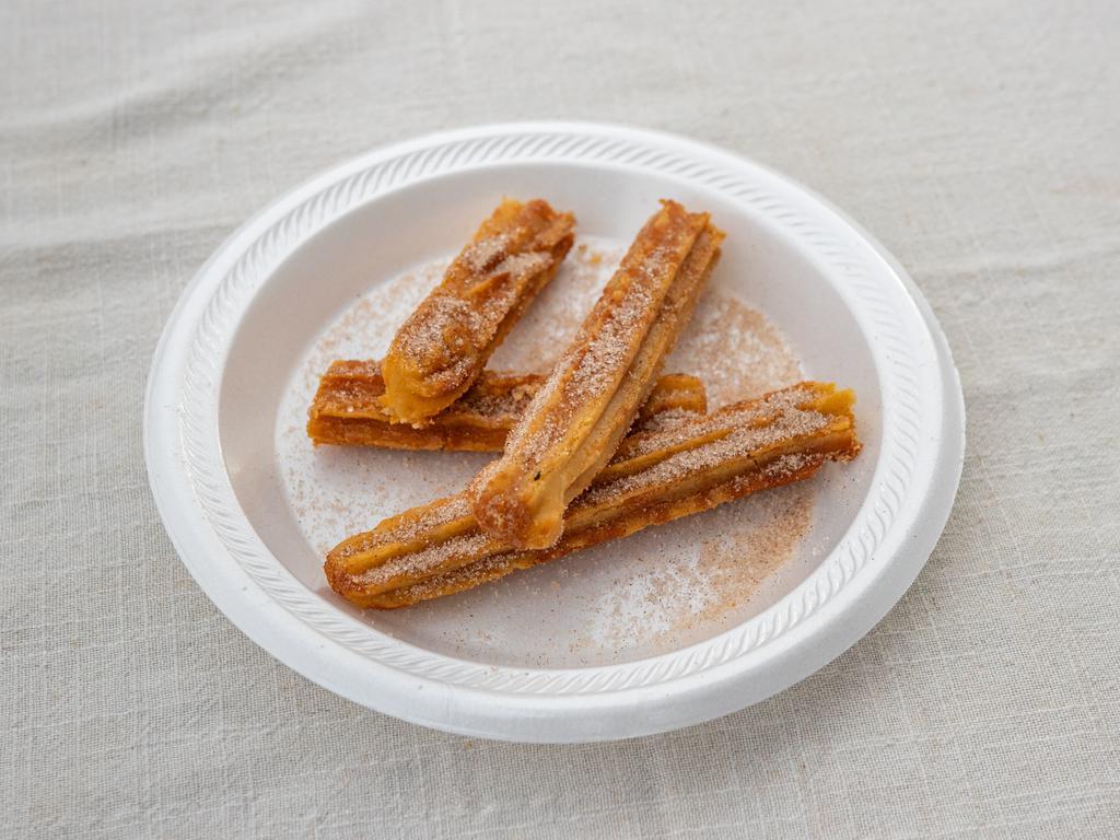 Churros · Fried pastry dusted with cinnamon sugar. 