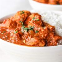 Butter Chicken · Cooked with tomato cream butter sauce. With basmati rice.