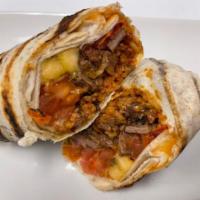 Island Wrap · A large tortilla filled with beef or chicken Suya, Jolof rice, ripe plantain, grilled onion ...
