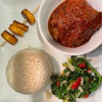 Stew and Rice · Flavorful tomato stew served with choice of protein- beef, chicken, goat. Served with steame...