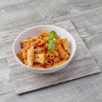 Rigatoni Buttera · With hot and sweet sausage, green peas and tomato-cream sauce.