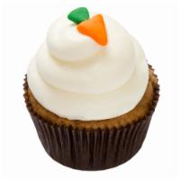 Carrot Cake Cupcakes Pack · A classic carrot cake cupcake topped with a cream cheese frosting and finished with a frosti...