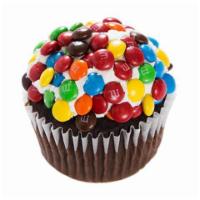 Candy Cup Cupcake · Chocolate cupcake topped with vanilla buttercream and rolled in mini M and M's.