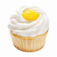 Lemon Burst Cupcake · Vanilla cupcake and filled with a light lemon curd custard. Topped with vanilla buttercream.